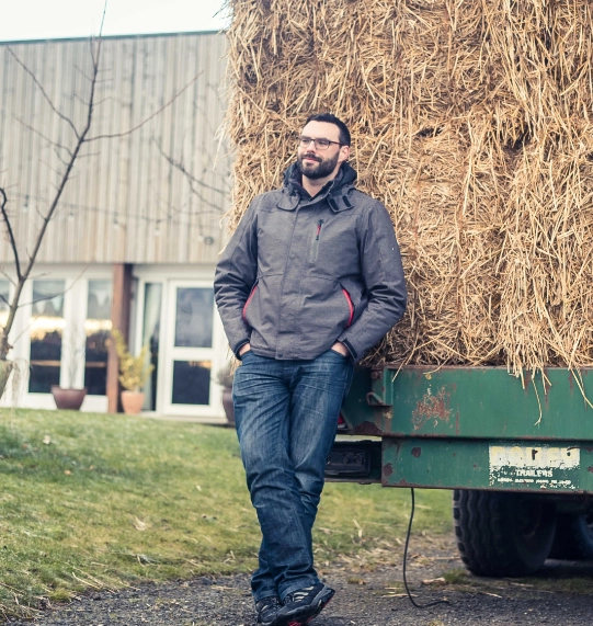 leaning on hay